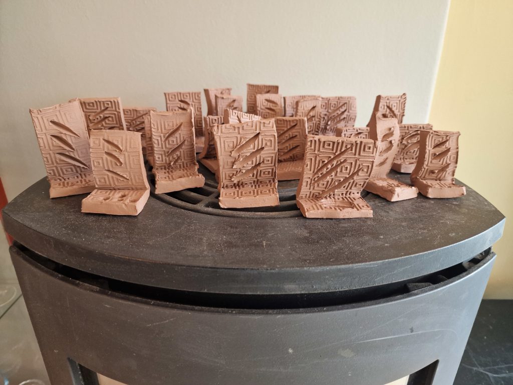 Bisque fire ceramic in an wood stove, drying clay