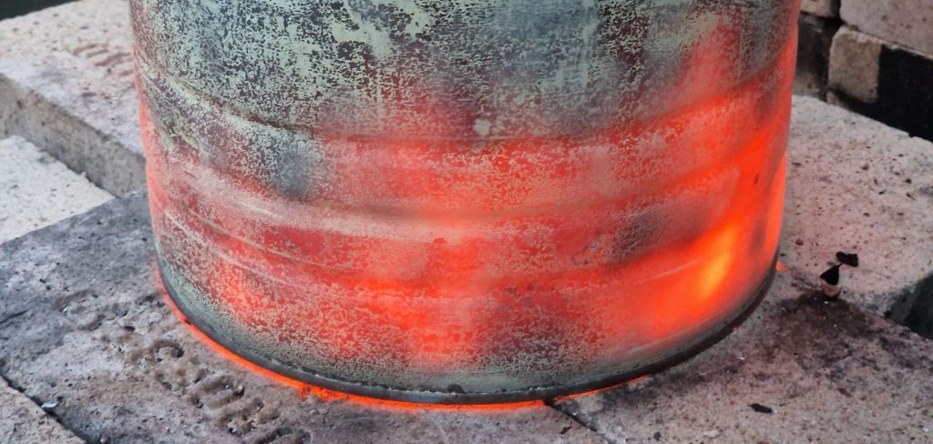 Tin Can kiln read glowing pottery 1100 degrees C